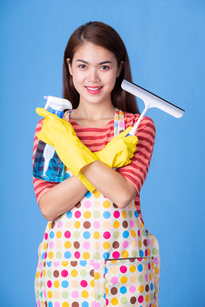 young-housekeeper-female-with-cleaning-supply-1.jpg
